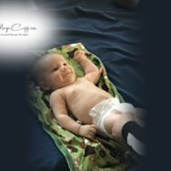 Infant Massage Benefits: Baby, Parents, Society